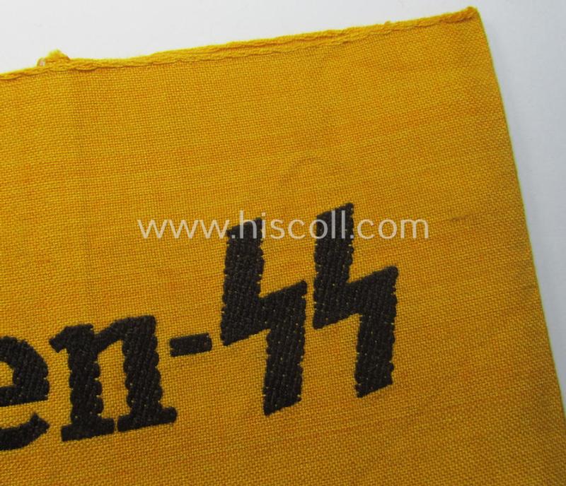 Golden-yellow-coloured- and/or linnen-based armband (ie. 'Armbinde') entitled: 'Waffen-SS'