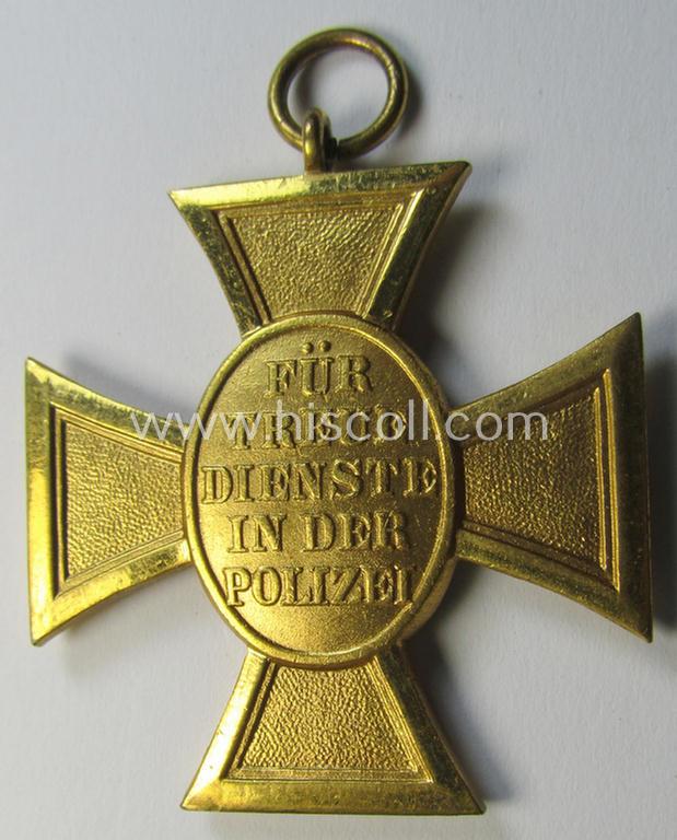 Attractive, golden-class 'Pol.-Dienstauszeichnung 1. Stufe' (or: police loyal-service medal first-class) that comes stored in its period, green-coloured (and luxuriously styled!) etui and that comes with its accompanying ribbon (ie. 'Bandabschnitt...
