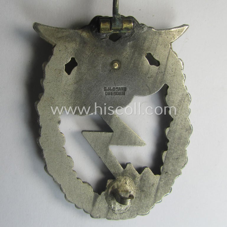 Mid- (ie. later-) war-period, zinc- (ie.'Feinzink'-) based version of a WH (Luftwaffe) 'Erdkampfabzeichen' (being a maker-marked example by the 'G.H. Osang'-company having a silvered- and 'riveted' eagle-device attached)