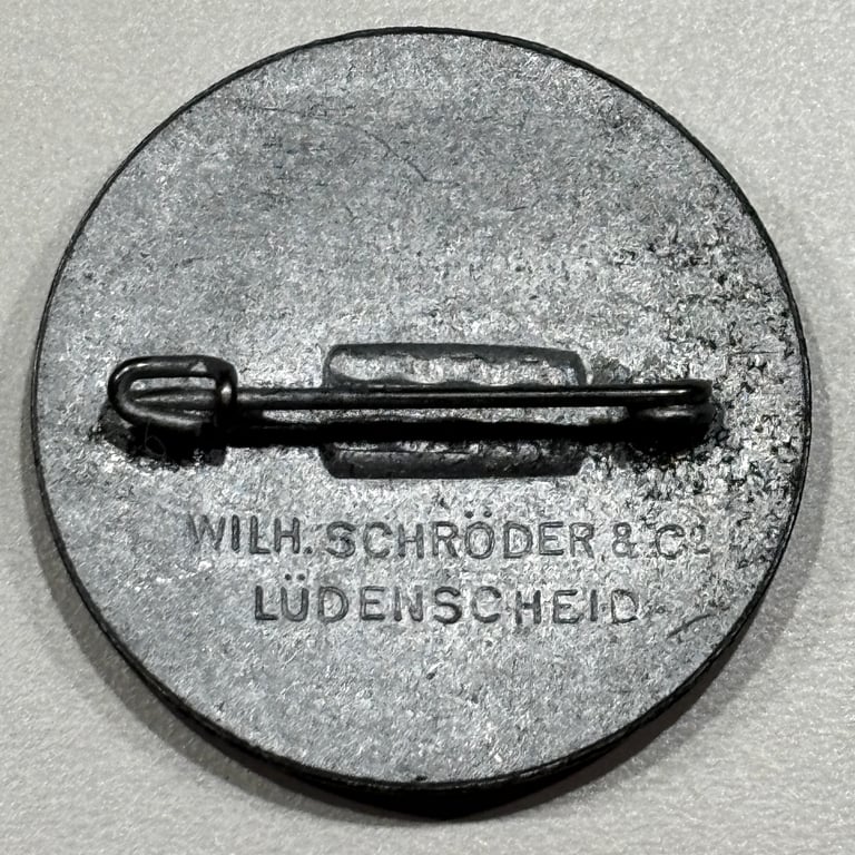 NSDAP Tinnie Badge – Wilhelm Schröder & Co., Lüdenscheid
