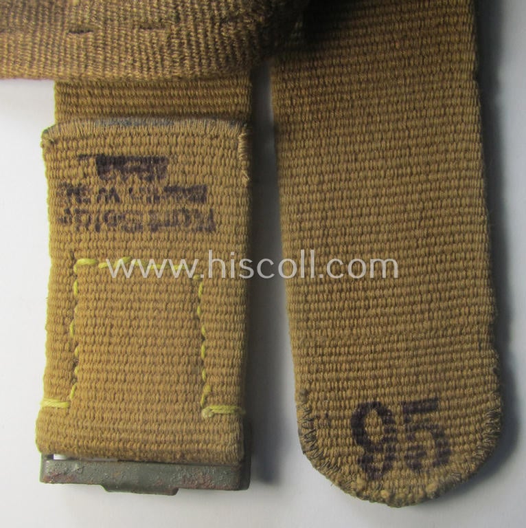 WH (Heeres ie. LW etc.) 'tropical-issued'- and entirely 'web-based' belt (ie. 'Koppelriemen') being a maker- (ie. 'Kurt Seidel - Berlin W 36 - 1943'-) marked and/or 95 cms.-sized example