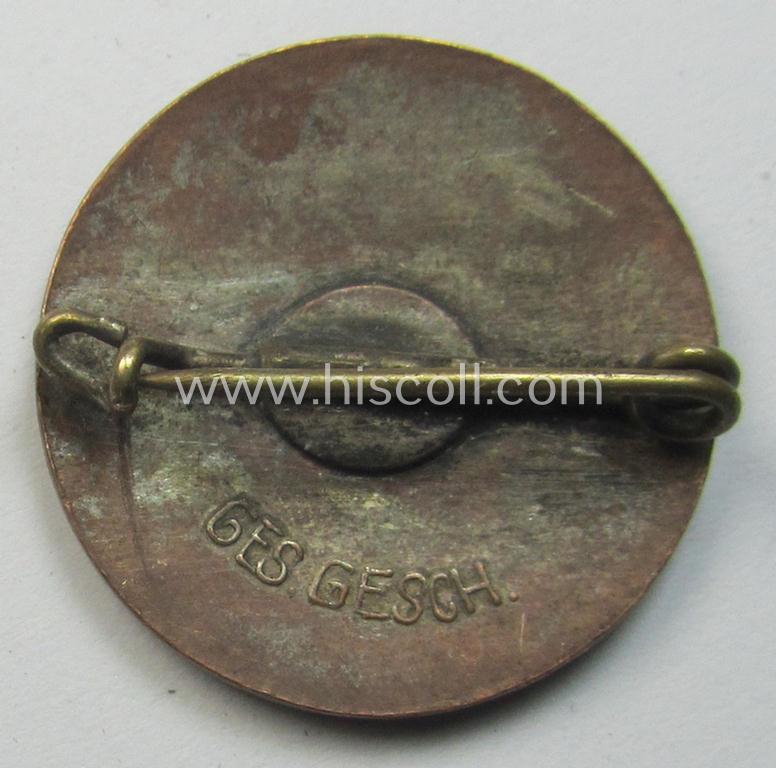 Attractive - bright-red-coloured- and I deem early-period! - 'N.S.D.A.P.'-membership-pin- ie. party-badge (or: 'Parteiabzeichen') being a non-maker-marked specimen that bears a: 'Ges.Gesch.'-patent-pending-designation