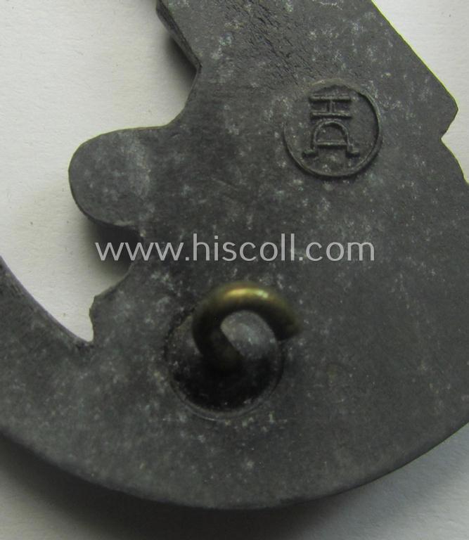 'Heeres-Flakkampf-Abzeichen' being a clearly maker- (ie. 'HA'-marked- and/or zinc- (ie. 'Feinzink'-) based specimen as was produced by the maker (ie. 'Hersteller') named: 'Hermann Aurich'