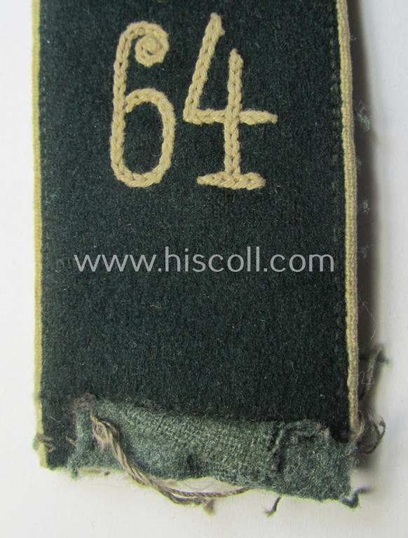 Single, WH (Heeres) EM-type 'cyphered' shoulderstrap: 'Soldat des Infanterie-Rgts. 64'
