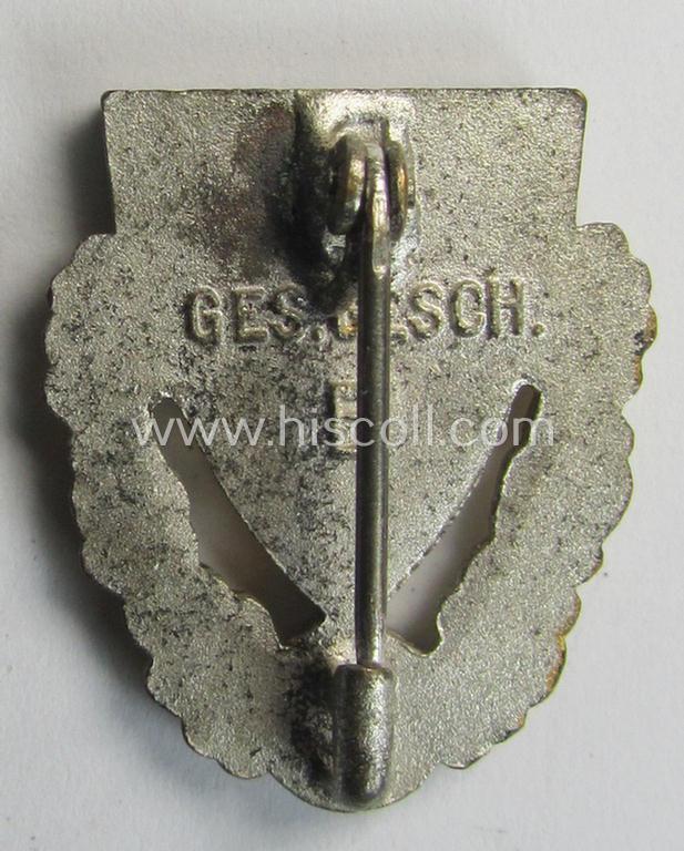 Honorary-membership lapel-pin (aka: 'Goldene Ehrennadel für 40 Jahre Mitgliedschaft im Nationalsocialistischer Reichskriegerbund' (ie. 'N.S.R.K.B.') being a maker- (ie. '5'-) marked example that bears a: 'Ges.Gesch.'-designation on its back