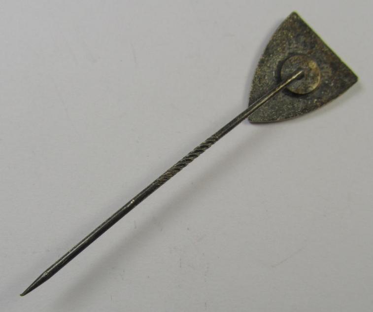 Membership-lapel-pin as was intended to signify membership within the: 'Nationalsocialistischer Reichskriegerbund' (ie. 'N.S.R.K.B.') being a non-maker-marked example that bears a: 'Ges.Gesch.'-patent-pending-designation on its back