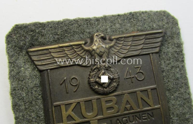 Stunning - and actually scarcely encountered! - WH (Heeres ie. Waffen-SS) 'Kuban'-campaign-shield that comes mounted onto its original field-grey-coloured- and/or woolen-based 'backing'