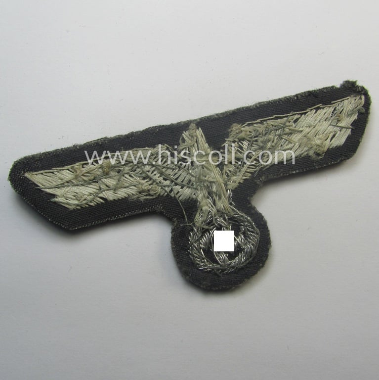 Clearly used- and/or worn, WH (Heeres) Panzer-related officers'-type, hand-embroidered breast-eagle (ie. 'Brustadler für Offiziere') as was intended for usage onto the 'wrap-around', officers'-pattern tunics