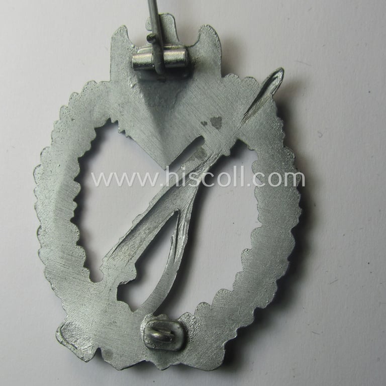 Superb, 'Infanterie Sturmabzeichen in Silber' being a non-maker-marked and/or typical zinc- (ie. 'Feinzink'-) based version (ie. 'crimped scooped rifle-variant') as was (I deem) procuded by the: 'S&L'- (ie. 'Steinhauer u. Lück'-) company