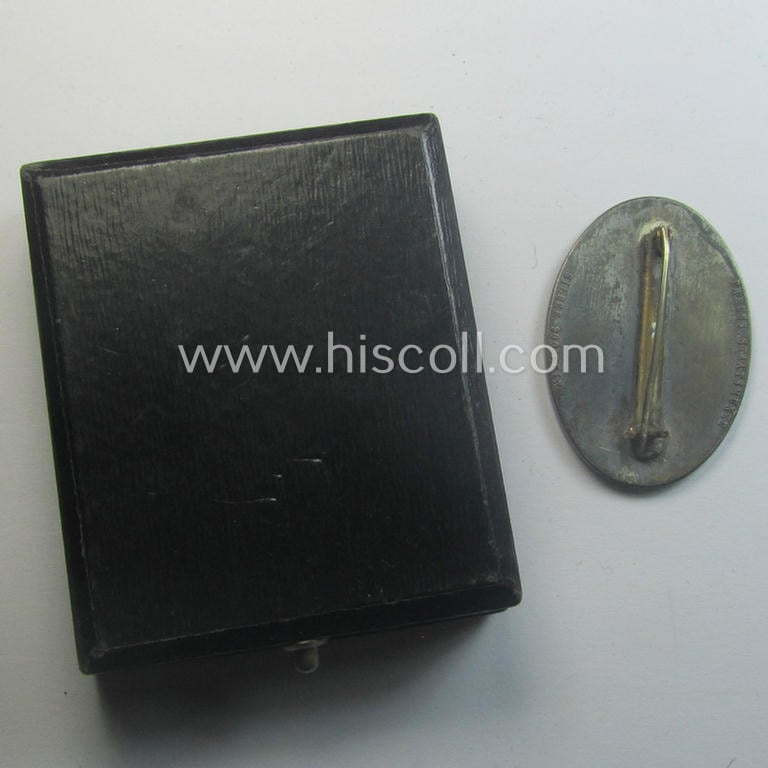 Pre-war-period- and/or genuine silver-based, so-called: 'Erinnerungszeichen Verdienste um das Feuerlöschwesen 1934' being a detailed- and maker- (ie. 'Preuss. Staatsmünze'-) marked, example that comes in its etui