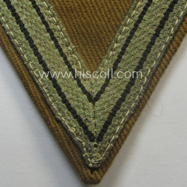 Attractive - and actually scarcely encountered! - piece of (I deem) SA- (ie. 'Sturmabteilungen') related arm-insignia, being a so-called: 'Ehrenwinkel für Altgediente Kämpfer o. Angehörigen der SA' (ie. honor-chevron for old campaigners)