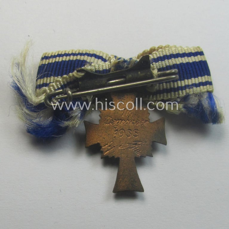 Miniature of an: 'Ehrenkreuz der deutschen Mutter - dritte Stufe' (or: bronze-class mothers'-cross) being a (typical) non-maker-marked example