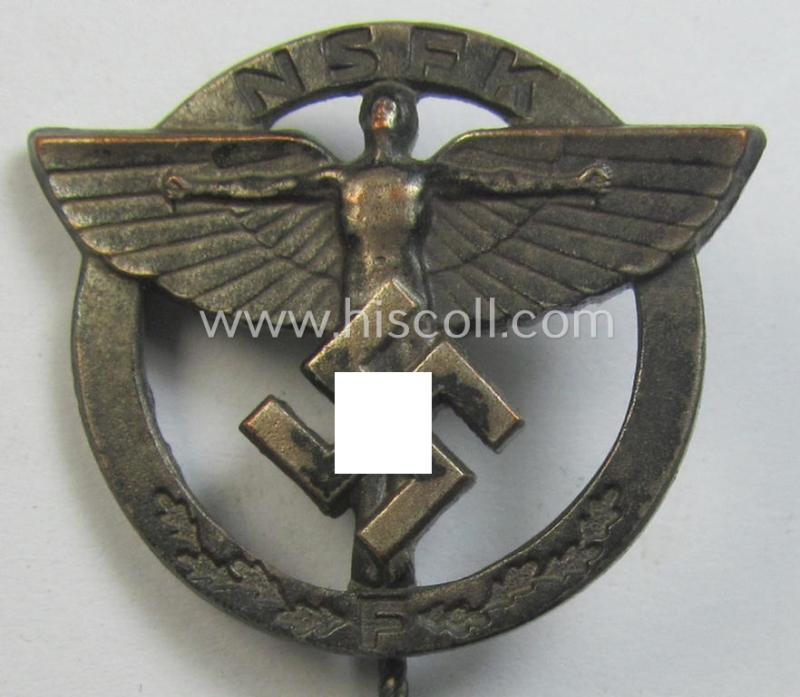 Attractive, N.S.F.K.- (or: 'National Soc. Flieger Korps'-) related, sponsoring-members'-badge (ie. 'Zivilabzeichen für förderende Mitglieder') being a maker- (ie. 'GB'-) marked example that is also bearing a: 'Ges.Gesch.'-designation