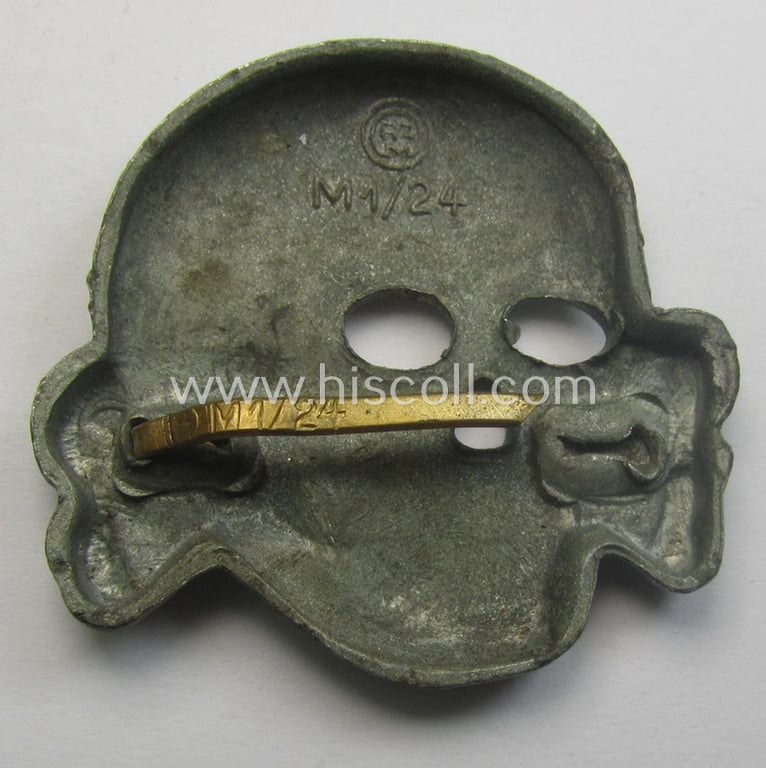Superb - albeit regrettably parly incomplete but nevertheless rarely encountered! - 'Waffen-SS' visor-cap skull (ie. 'Totenkopf für Schirmmütze') being a detailed- and/or maker- (ie. 'RzM M1/24'-) marked example
