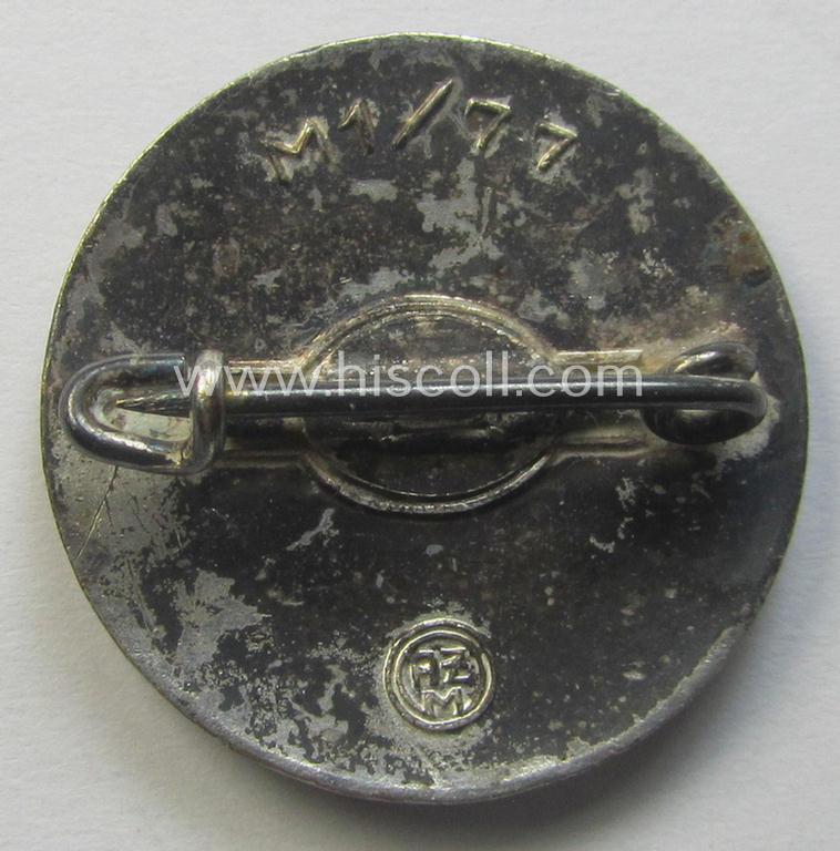 'N.S.D.A.P. - Parteiabzeichen' showing the makers'-designation: 'RzM' and/or: 'M1/77'