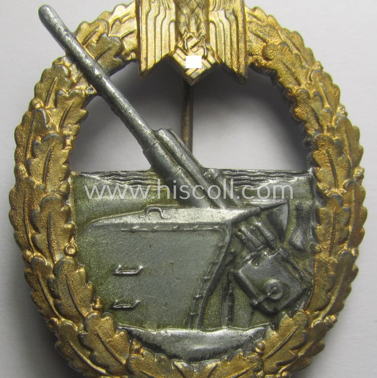 WH (Kriegsmarine) 'Marine-Artillerie-Abzeichen' being a typical non-maker-marked- and/or zinc- (ie. 'Feinzink'-) based example as was (presumably) produced by the: 'Alois Rettenmaier'-company