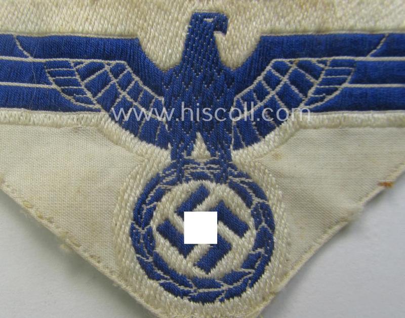 Truly used- and/or tunic-removed, WH (KM) related breast-eagle (ie. 'Brustadler für Mannschaften u. Uffz. der Kriegsmarine') being a 'standard-issue'-pattern-example as executed in the 'BeVo'-weave-pattern on a white-coloured background
