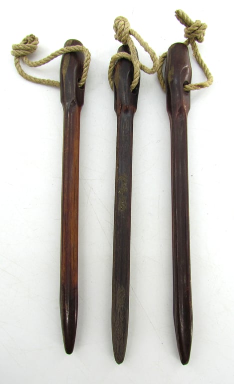 Matching set of 3 Bakelite tent pegs