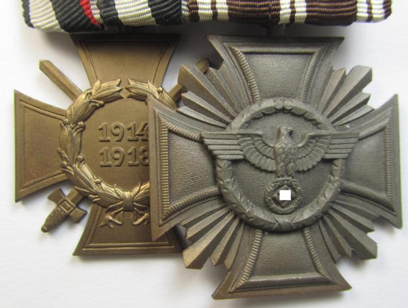 Superb, 2-pieced N.S.D.A.P.-related medal-bar (ie. 'Ordenspange') showing resp. an: a: 'FKK 1914-18 mit Schwn.' and a: 'N.S.D.A.P.-Dienstausz. in Bronze' (ie. '3. St. für 10 Jahre t. D.') that both come mounted as a (detachable!) 'Doppelspan...