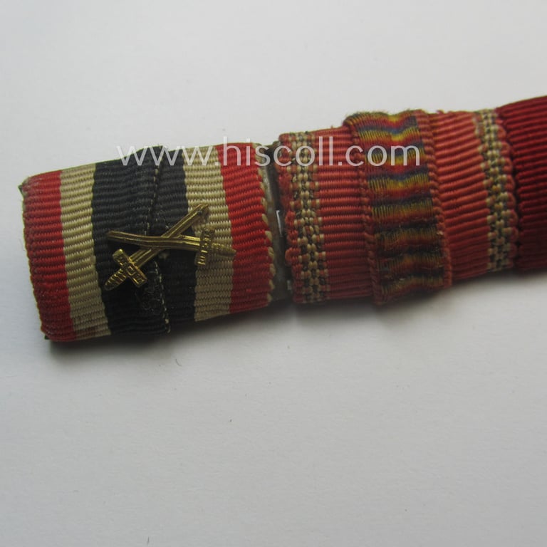 3-pieced, WH (Heeres etc.) medal-bar (ie. 'Feld- o. Bandspange') showing resp. the ribbons for a: 'KvK II.Kl. mit Schwertern', a: Romanian medal 'Kreuzzug gegen den Kommunismus' and an: 'Ost'-medal