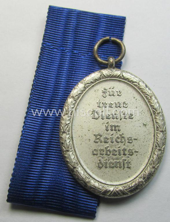 Attractive example of a: RAD (ie. 'Reichsarbeitsdienst') so-called: 'Dienstauszeichnung 3. Stufe für Männer' (as was intended for 12 years loyal-service) and that came together with its period piece of ribbon (ie. 'Bandabschnitt')