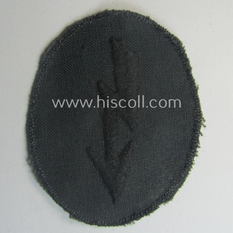 Thin-shaped- ie. 'variant'-pattern, WH (Heeres) trade- and/or special-career insignia ie. machine-embroidered signal-blitz (being a non-maker-marked example as executed in black) as intended for a soldier serving within the: 'Pionier-Trpn.'