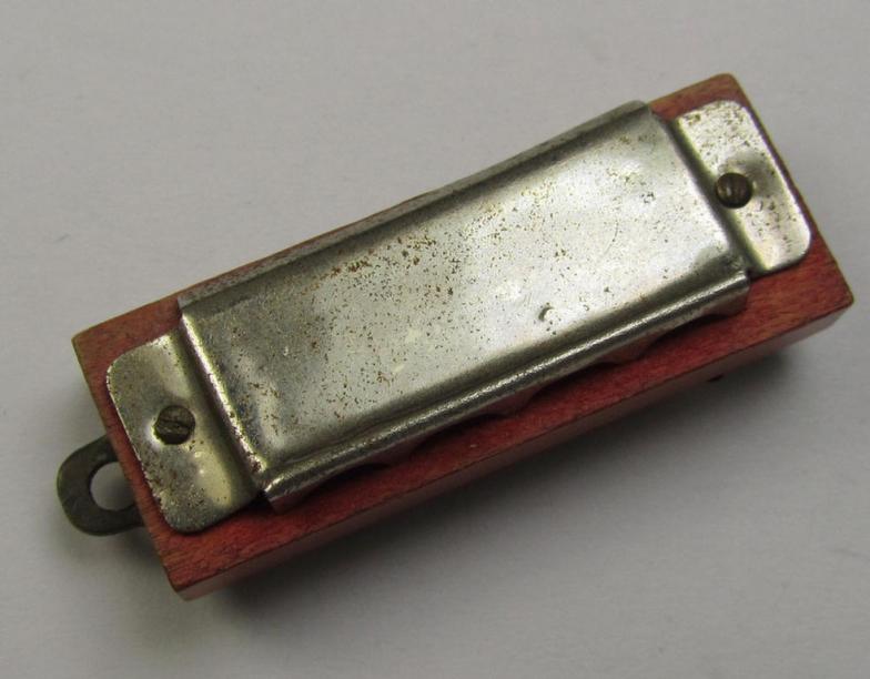 Unusally seen so-called: WHW- (ie. 'Winterhilfswerke'-) related miniature harmonica entitled: 'WHW' that comes  in a moderately used condition
