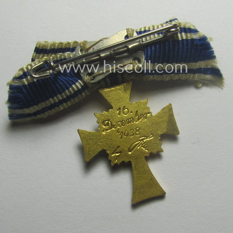 Miniature of an: 'Ehrenkreuz der deutschen Mutter - erste Stufe' (or: golden-class mothers'-cross) being a non-maker-marked example that comes in an overall nice- (albeit hardly worn- nor used-), condition
