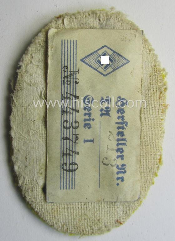 Early-period, HJ- (ie. 'Hitlerjugend') trade- or: specialist-armbadge as executed in the hand-embroidered pattern as was intended for usage by a: 'Reiter-HJ'-member (or: mounted-HJ-member) still retaining its period 'RzM'-etiket