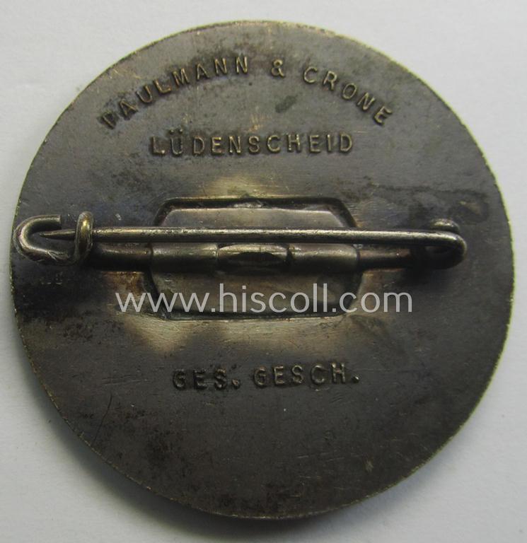 Commemorative, silvered 'Buntmetall'-based N.S.D.A.P.- (ie. WHW-) related 'tinnie' being a maker- (ie. 'Paulmann u. Crone'-) marked example depicting A.Hitler and text: 'Hitlers' Dank für den Dienst am Volke - Gau Süd-Hannover - Braunschweig...