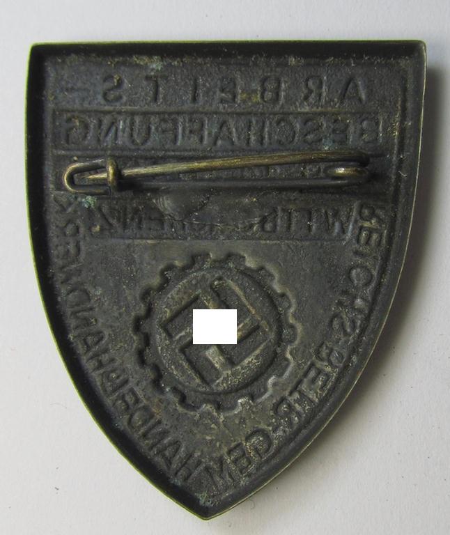 Silver-toned- (and/or tin-based) RAD- (ie. 'Reichsarbeitsdienst'-) related day-badge depicting a so-called: 'RAD-Zahnrad' and text: 'Arbeitsbeschaffung - 28.9.-14.10.1934 - Wttbg. Hohenz.' and sub-titled: 'Reichs-Betr. Gem. - Handel u. Handwer...