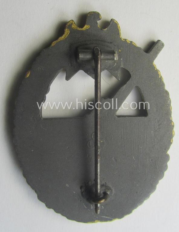 'Virtually mint' example of a WH (Kriegsmarine) 'Marine-Artillerie-Abzeichen' being a maker- (ie. F.L.L.-) marked- and/or typical zinc- (ie. 'Feinzink'-) based example as was produced by the: 'Friedrich Linden'-company