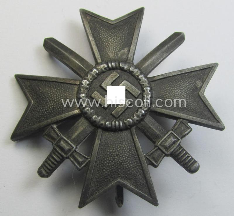 Attractive - and truly converse-shaped! - 'Kriegsverdienstkreuz 1. Klasse mit Schwerter' being a non-maker-marked specimen by a (by me) unidentified maker as executed in silverish-grey-coloured and/or typical zinc-based metal (ie. 'Feinzink')