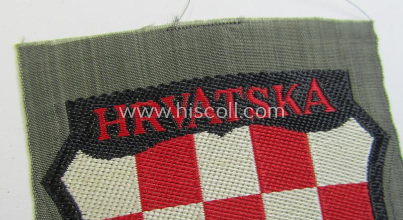 Superb, multi-coloured- and/or 'BeVo'-woven armshield (ie. 'Ärmelschild') entitled: 'Hrvatska' as was intended for usage by a volunteer who served within the 'Deutsche Wehrmacht' ie. within the 'Kroatische Legion'