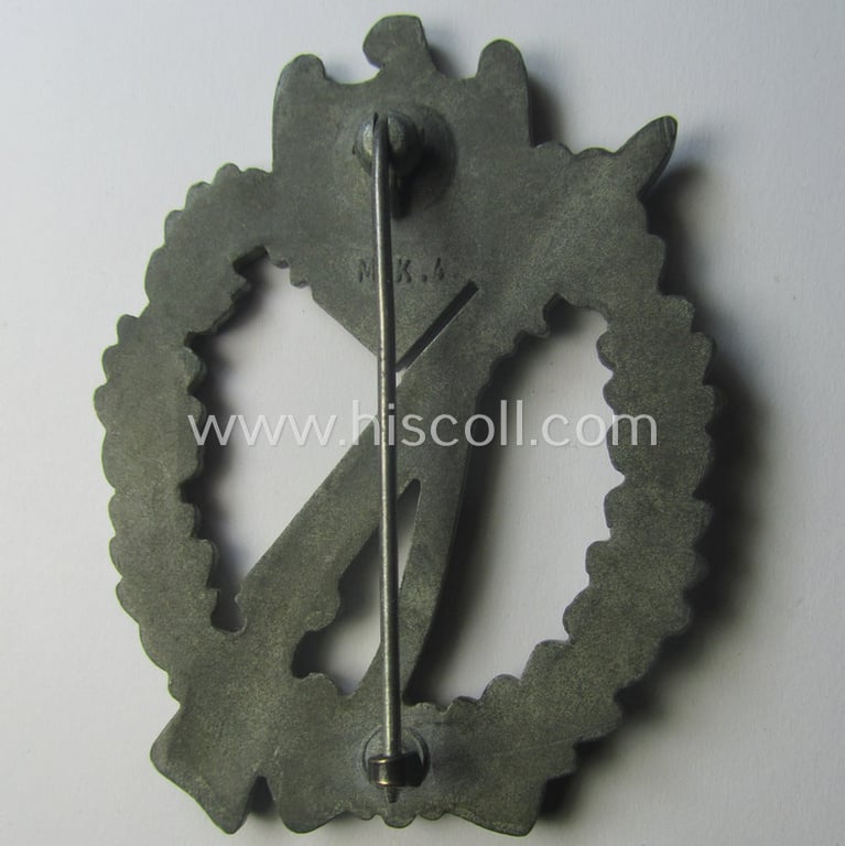 'Infanterie-Sturmabzeichen in Silber' (or: silver-class infantry-assault badge ie. IAB) being a neatly maker- (ie. 'MK 4'- or: 'Metall u. Kunststoff'-) marked example as executed in greyish-silverish-coloured 'Feinzink'