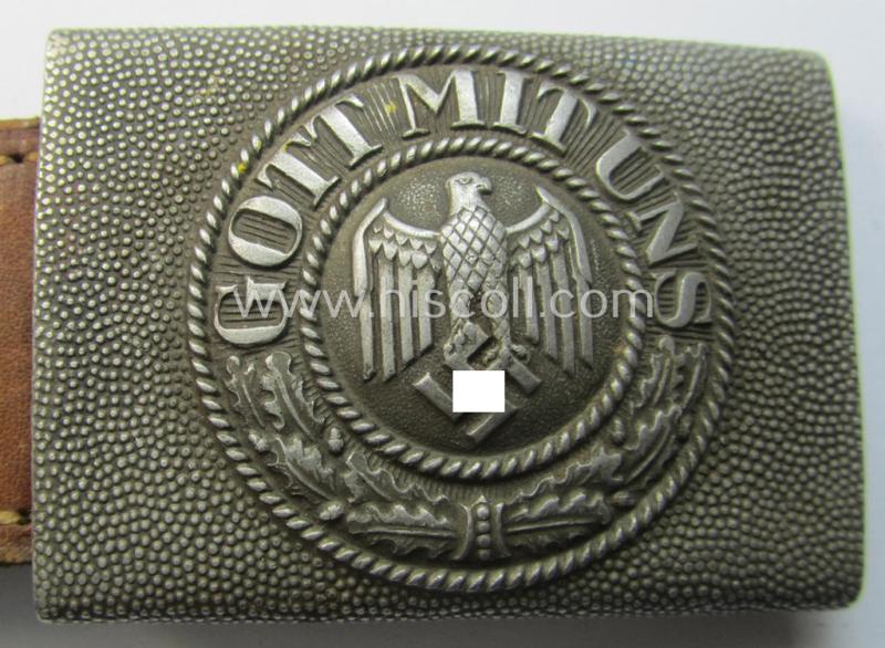 WH (Heeres) 'standard-pattern', field-grey-toned- and aluminium-based belt-buckle being a maker- (I deem 'Bernh. Haarmann'-) marked- and/or '1938'-dated example that comes mounted onto its leather-based tab