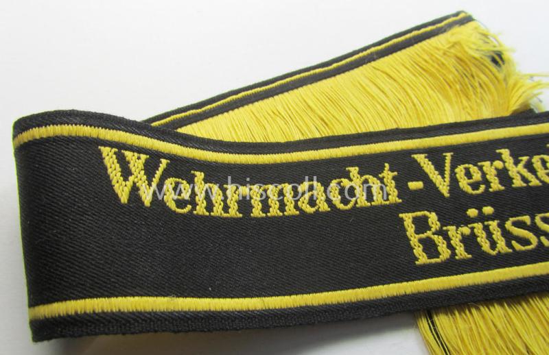 Attractive, 'DRB' (ie. 'Deutsche Reichsbahn') cuff-title (ie. 'Armbinde') as executed in 'BeVo'-weave-pattern entitled: 'Wehrmacht-Verkehrsdirektion Brüssel' (being a presuambly never worn example that comes in a 'virtually mint' conditio...