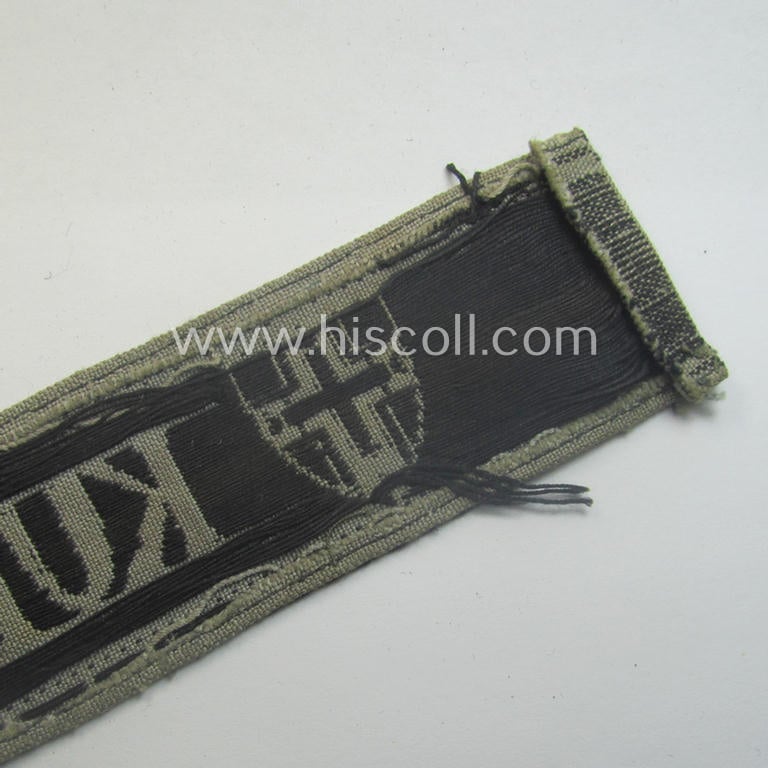 WH (Heeres ie. Kriegsmarine) cuff-title- ie. armband (ie. 'Ärmelstreifen') entitled: 'Kurland' that comes in an overall very nice- (albeit clearly used- ie. tunic-removed-), condition