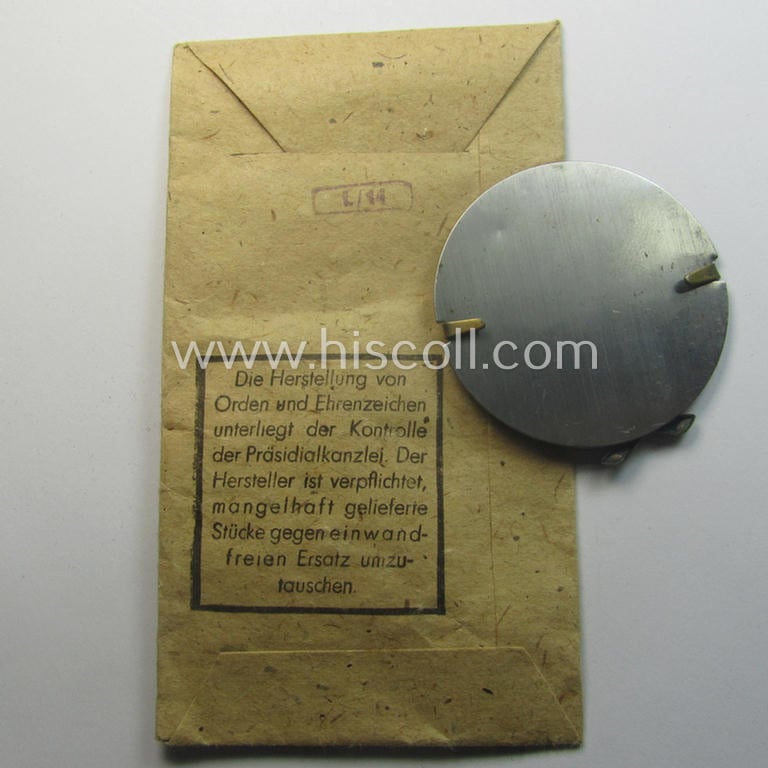 WH (Heeres, LW ie. Waffen-SS-) so-called: 'Kraftfahrbewährungs-Abzeichen in Bronze' being a 'virtually mint' example as was produced by the maker: 'Friedrich Orth - Wien IV/56' (ie. 'L/14') and that came stored in its 'Zellstoff'-based pouch