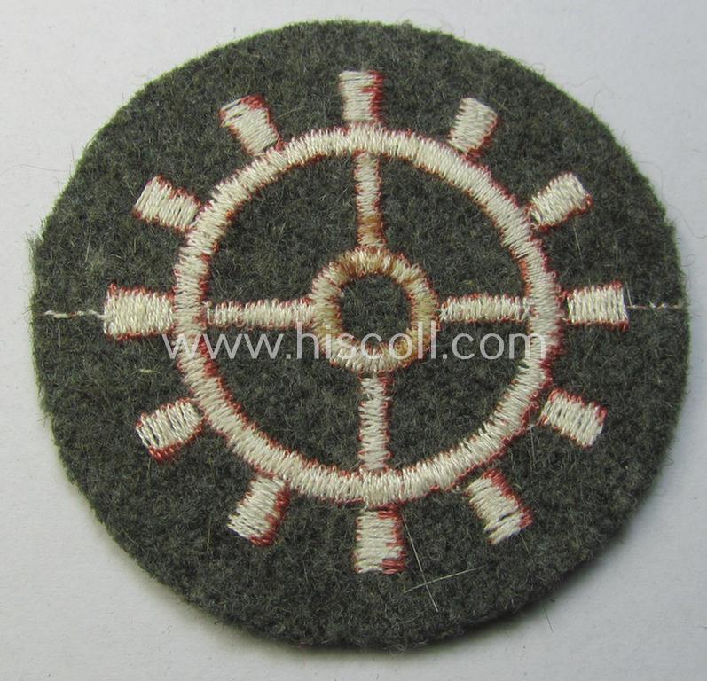 WH (Heeres ie. 'Panzer'-) machine-embroidered, trade- ie. special-career patch as was intended for usage by a: 'Panzerwarte o. Kfz.-Warte II' (ie. 'Panzer'- and/or vehicle mechanic)