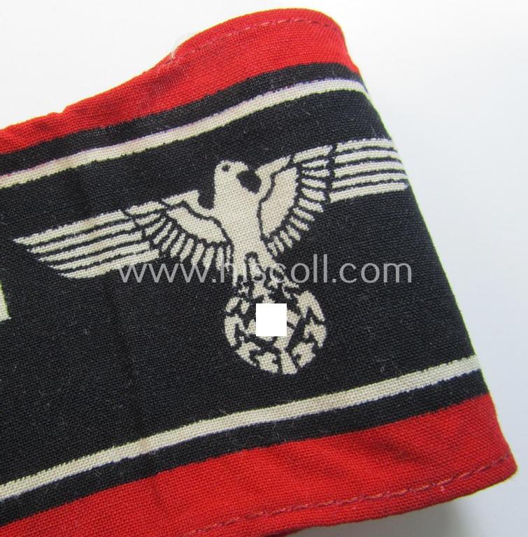 Superb, typically printed- and/or later-war-period, bright-red- and/or black-coloured so-called: 'Deutscher Volkssturm'-armband (ie. 'Armbinde') that comes in an overall very nice- (I deem hardly used- nor worn- ie. 'virtually mint'-), conditio...