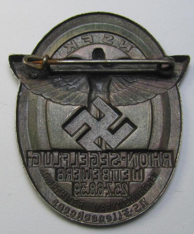 Silver-toned, N.S.F.K.-related day-badge (ie. 'tinnie') being a non-maker-marked example as was issued to commemorate a specific meeting ie. national rally entitled: 'N.S.F.K. Rhön-Segelflug Wettbewerb 23.7.-6.8.39'