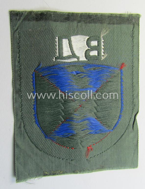 Attractive - and rarely seen! - armshield as executed in the neat 'BeVo'-weave pattern depicting the interwoven 'Cyrillic' characters: 'BA' (as was intended for the Russian volunteers serving within the 'Don Cossacks')