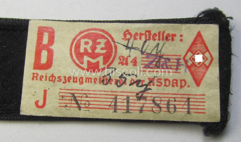 Neat - and naturally single! - black-piped 'DJ- o. Deutsches Jungvolk' shoulderstrap as was intended for usage by a: 'DJ-Mitglied' who served within the: 'Bann 310' (310 = 'Donau') and that comes with its period-attached 'RzM'-etiket