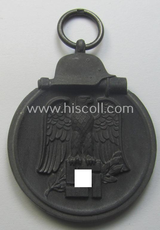 Neatly maker- (ie. '15'-) marked medal: 'Winterschlacht im Osten 1941/42' that came stored in its period pouch by the (Austrian-based) company: 'Friedrich Orth'