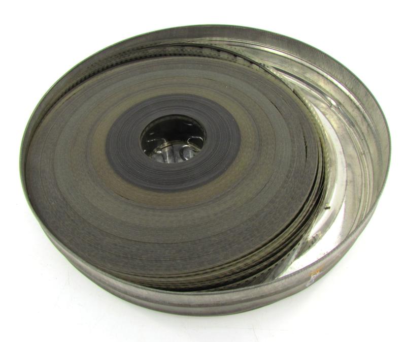 Large Film can with WWII 35mm film included