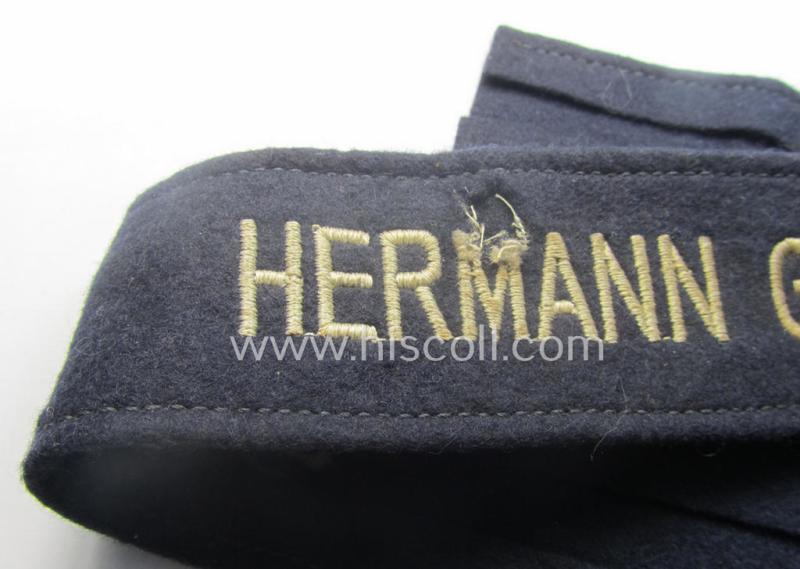 Typical 'smooth-woolen'-based, enlisted-mens'- (ie. NCO-) pattern WH (Luftwaffe) cuff-title (ie. 'Ärmelstreifen') entitled: 'Hermann Göring' (being an I deem presumably issued- albeit never worn nor tunic-attached and minimally damaged example...