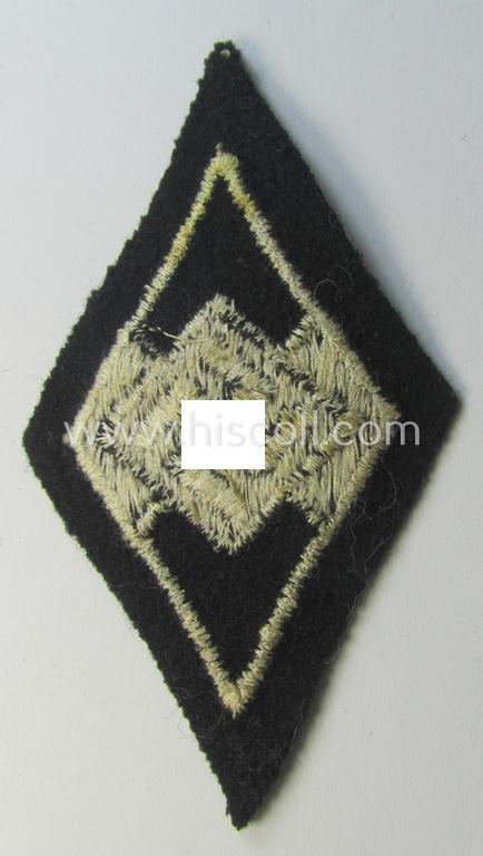 Waffen-SS-pattern, machine-embroidered and/or black- and white-coloured sleeve-insignia (ie. 'Ärmelraute') depicting a so-called: 'HJ-Raute' as was used and intended to signify former membership within the 'Hitlerjugend'