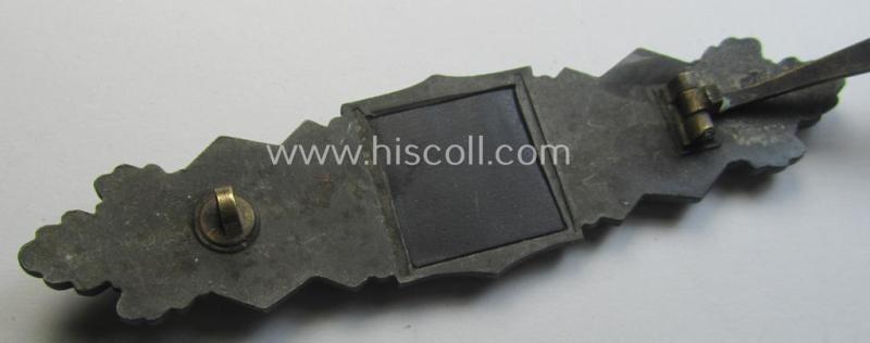 'Nahkampfspange in Bronze' (or: bronze-class close-combat clasp ie. CCC) being a (typical) non-maker-marked- and/or minimally converse-shaped specimen as was produced by the maker- (ie. 'Hersteller') 'Steinhauer & Lück'