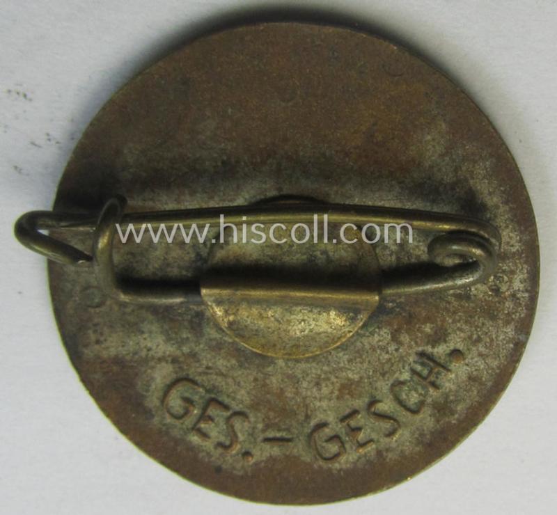 Early-pattern 'N.S.D.A.P. - Parteiabzeichen' showing a: 'Ges.Gesch.'-patent-pending-designation